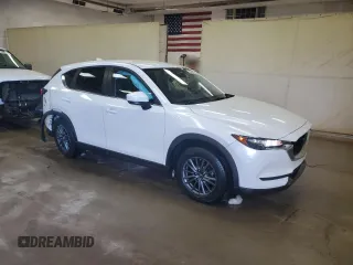 2019 Mazda CX-5 Touring with VIN JM3KFBCM1K0697500, listed as a Copart auction lot 46460735 with 69,412 mi miles and Salvage Title. Bid and sale history available at carsss.com. Image 4.