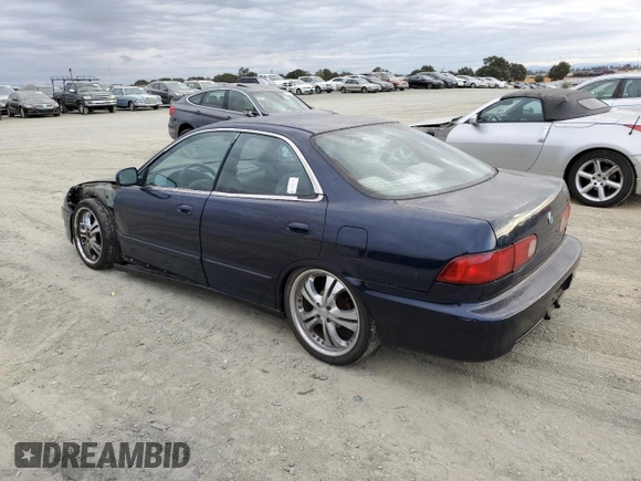 1998 Acura Integra LS with VIN JH4DB7653WS002571, listed as a Copart auction lot 73806394 with 258,143 mi miles and Salvage title. Bid and sale history available at DreamBid. Image 2.