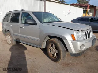 2007 Jeep Grand Cherokee Laredo with VIN 1J8GS48K77C515424, listed as a IAAI auction lot 41072236 with 263,248 mi miles. Bid and sale history available at carsss.com. Image 1.