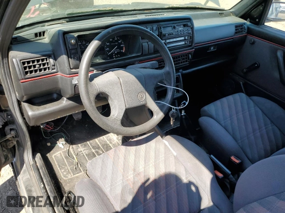 1991 Volkswagen GTI с VIN 3VWDB21G7MM023746, выставлен на аукционе Copart как лот 66414904 с пробегом 105 926 миль миль и На запчасти • Non repairable. История ставок и продаж доступна на DreamBid. Изображение 8.