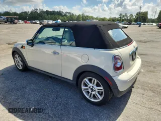 2011 MINI Convertible with VIN WMWZN3C59BTZ78433, listed as a Copart auction lot 65509575 with 102,800 mi miles and Clean title. Bid and sale history available at DreamBid. Image 2.