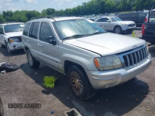 2004 Jeep Grand Cherokee Limited with VIN 1J4GW58N64C283657, listed as a IAAI auction lot 42542150 with 228,910 mi miles and . Bid and sale history available at DreamBid. Image 1.