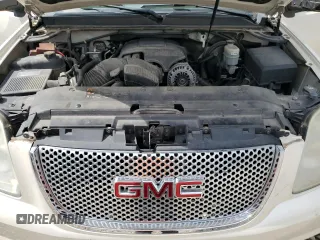 2011 GMC Yukon Denali with VIN 1GKS1EEFXBR313625, listed as a Copart auction lot 72634294 with 129,834 mi miles and Salvage Title. Bid and sale history available at carsss.com. Image 13.