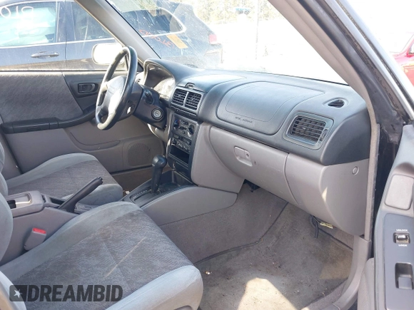 1999 Subaru Forester L with VIN JF1SF6351XH716957, listed as a IAAI auction lot 41969521 with 253,696 mi miles. Bid and sale history available at carsss.com. Image 5.