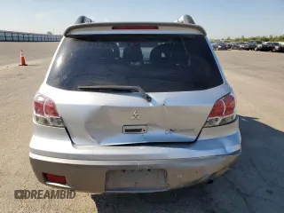 2004 Mitsubishi Outlander XLS with VIN JA4LX41F14U028546, listed as a Copart auction lot 63319084 with 169,105 mi miles and Salvage Title. Bid and sale history available at carsss.com. Image 6.