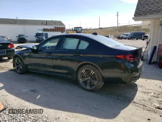 2022 BMW M5 z VIN WBS83CH01NCH75182, wystawiony jako Copart lot #46284903 z przebiegiem Nie podano mil oraz . Historia ofert i sprzedaży dostępna na DreamBid. Obrazek 2.