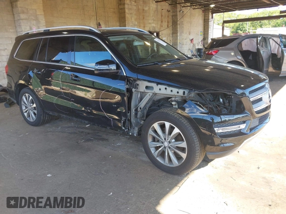 2014 Mercedes-Benz GL 450 z VIN 4JGDF7CE7EA395551, wystawiony jako IAAI lot #42247332 z przebiegiem 105 636 mil mil oraz . Historia ofert i sprzedaży dostępna na DreamBid. Obrazek 1.