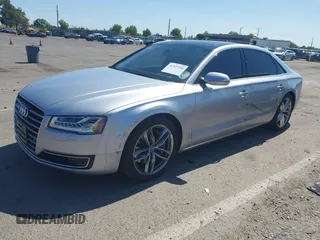 2015 Audi A8 3.0T z VIN WAU3GAFD6FN033635, wystawiony jako IAAI lot #42327204 z przebiegiem 87 167 mil mil oraz . Historia ofert i sprzedaży dostępna na DreamBid. Obrazek 2.