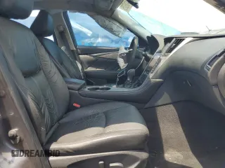 2015 Infiniti Q50 with VIN JN1BV7AP9FM332795, listed as a Copart auction lot 63416925 with 106,986 mi miles and Salvage title. Bid and sale history available at DreamBid. Image 7.