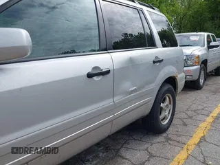 2004 Honda Pilot EX z VIN 2HKYF18524H542877, wystawiony jako IAAI lot #42340950 z przebiegiem 254 786 mil mil oraz . Historia ofert i sprzedaży dostępna na DreamBid. Obrazek 6.