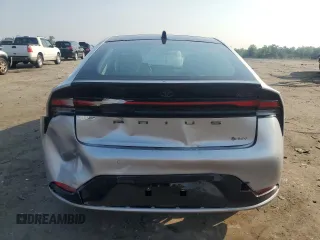 2024 Toyota Prius LE with VIN JTDADABU8R3020720, listed as a Copart auction lot 60815005 with 2,594 mi miles and Salvage title. Bid and sale history available at DreamBid. Image 6.
