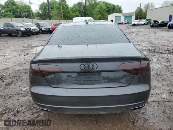2017 Audi A8 z VIN WAU44AFD0HN004258, wystawiony jako Copart lot #55283985 z przebiegiem 128 059 mil mil oraz Szkoda całkowita • Salvage title. Historia ofert i sprzedaży dostępna na DreamBid. Obrazek 6.