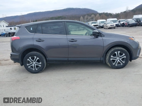 2018 Toyota RAV4 LE with VIN JTMBFREV4JJ742428, listed as a IAAI auction lot 41912813 with 114,159 mi miles. Bid and sale history available at carsss.com. Image 14.
