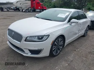 2019 Lincoln MKZ Hybrid Reserve II z VIN 3LN6L5MUXKR632126, wystawiony jako IAAI lot #42186526 z przebiegiem 130 364 mil mil oraz . Historia ofert i sprzedaży dostępna na DreamBid. Obrazek 2.