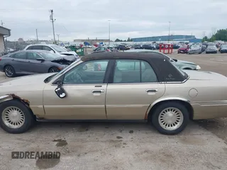 1999 Mercury Grand Marquis LS с VIN 2MEFM75W6XX630636, выставлен на аукционе IAAI как лот 42471128 с пробегом 216 223 миль миль и . История ставок и продаж доступна на DreamBid. Изображение 14.
