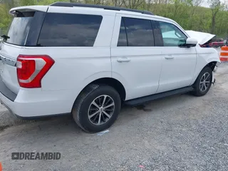 2019 Ford Expedition XLT with VIN 1FMJU1JT0KEA72504, listed as a IAAI auction lot 42123316 with 118,906 mi miles and . Bid and sale history available at DreamBid. Image 4.