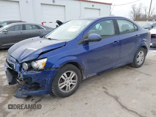 2012 Chevrolet Sonic LS z VIN 1G1JA5SH6C4199806, wystawiony jako IAAI lot #41454660 z przebiegiem 124 691 mil mil oraz . Historia ofert i sprzedaży dostępna na DreamBid. Obrazek 17.