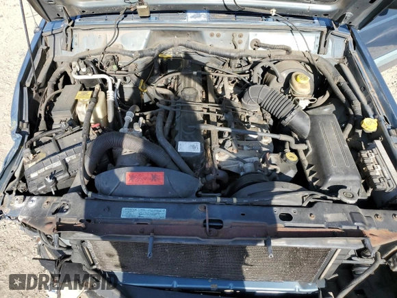 1998 Jeep Cherokee Sport with VIN 1J4FJ68S6WL283022, listed as a Copart auction lot 57451125 with 207,618 mi miles and Salvage title. Bid and sale history available at DreamBid. Image 12.