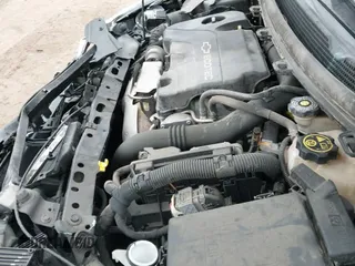 2017 Chevrolet Cruze LT z VIN 3G1BE6SM3HS548584, wystawiony jako IAAI lot #41208267 z przebiegiem 105 807 mil mil oraz . Historia ofert i sprzedaży dostępna na DreamBid. Obrazek 19.