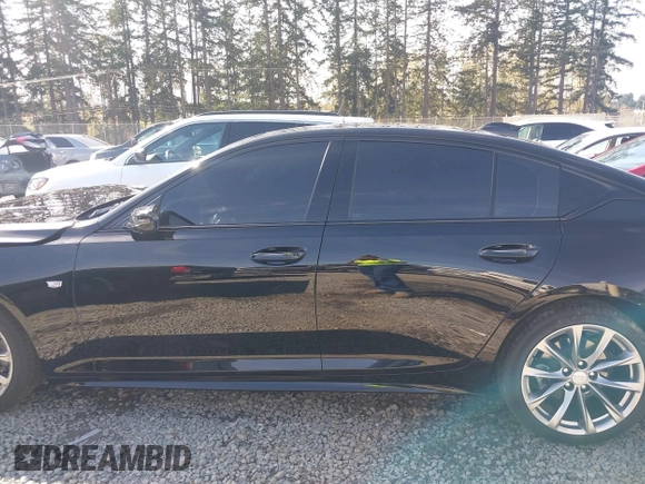 2025 Cadillac CT5 Sport with VIN 1G6DP5RK0S0109112, listed as a IAAI auction lot 41955382 with 5,107 mi miles and . Bid and sale history available at DreamBid. Image 14.