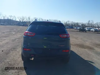 2014 Jeep Cherokee Trailhawk with VIN 1C4PJMBS4EW179763, listed as a IAAI auction lot 41988048 with 152,681 mi miles. Bid and sale history available at carsss.com. Image 17.