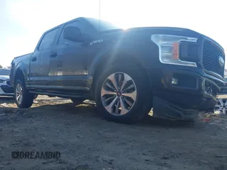 2018 Ford F-150 XL with VIN 1FTEW1C50JFA26307, listed as a IAAI auction lot 41091268 with 129,012 mi miles. Bid and sale history available at carsss.com. Image 1.