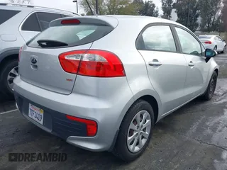 2016 Kia Rio LX with VIN KNADM5A36G6646238, listed as a IAAI auction lot 41748617 with 129,243 mi miles. Bid and sale history available at carsss.com. Image 4.
