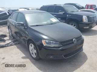 2012 Volkswagen Jetta TDI w/Premium with VIN 3VWLL7AJ0CM360730, listed as a IAAI auction lot 42029644 with 159,074 mi miles and . Bid and sale history available at DreamBid. Image 1.