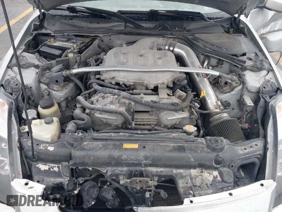 2003 Nissan 350Z Touring z VIN JN1AZ34E43T014247, wystawiony jako IAAI lot #42120812 z przebiegiem 112 263 mil mil oraz . Historia ofert i sprzedaży dostępna na DreamBid. Obrazek 10.