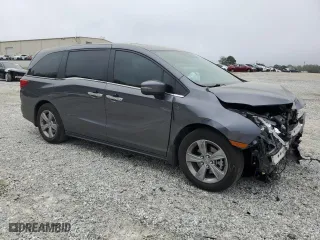 2019 Honda Odyssey EX-L with VIN 5FNRL6H74KB123002, listed as a Copart auction lot 51595065 with 60,033 mi miles and Salvage Title. Bid and sale history available at carsss.com. Image 4.