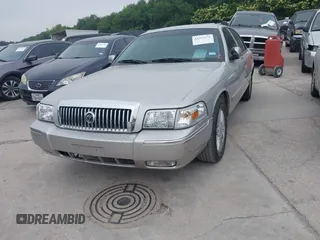 2008 Mercury Grand Marquis LS z VIN 2MEFM75V58X635416, wystawiony jako IAAI lot #42293676 z przebiegiem 118 838 mil mil oraz . Historia ofert i sprzedaży dostępna na DreamBid. Obrazek 2.