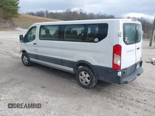 2019 Ford Transit Passenger XL with VIN 1FBZX2YM8KKA31871, listed as a IAAI auction lot 41168344 with 95,957 mi miles and . Bid and sale history available at DreamBid. Image 3.
