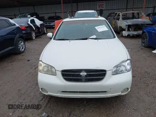 2000 Nissan Maxima GXE z VIN JN1CA31A4YT206065, wystawiony jako IAAI lot #41952514 z przebiegiem 2 953 347 mil mil oraz . Historia ofert i sprzedaży dostępna na DreamBid. Obrazek 14.