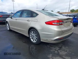 2017 Ford Fusion Hybrid SE with VIN 3FA6P0LU0HR355269, listed as a IAAI auction lot 41745299 with 97,675 mi miles and . Bid and sale history available at DreamBid. Image 3.