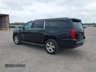 2016 Chevrolet Suburban LT with VIN 1GNSKHKC4GR233059, listed as a IAAI auction lot 42137869 with 115,571 mi miles. Bid and sale history available at carsss.com. Image 3.