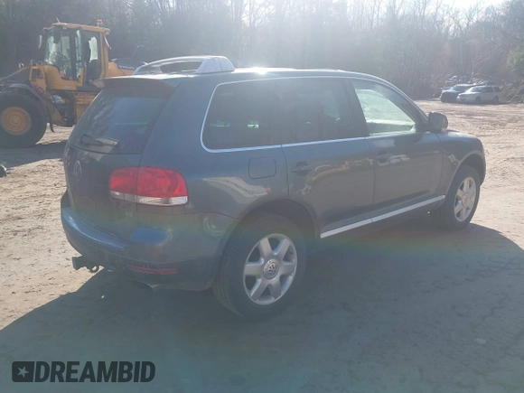 2005 Volkswagen Touareg 4.2L V8 with VIN WVGZM77L25D079655, listed as a IAAI auction lot 42033696 with 187,389 mi miles and . Bid and sale history available at DreamBid. Image 4.