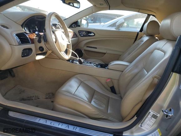 2014 Jaguar XK with VIN SAJWA4GB6ELB54454, listed as a Copart auction lot 85275384 with 53,532 mi miles and Salvage Title. Bid and sale history available at carsss.com. Image 7.