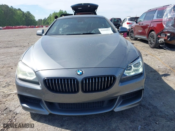 2012 BMW 6 Series 650i with VIN WBALX3C5XCC528484, listed as a IAAI auction lot 42080063 with 120,995 mi miles. Bid and sale history available at carsss.com. Image 6.