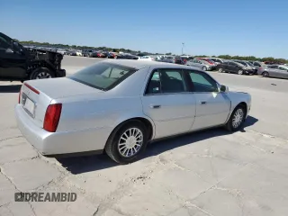 2003 Cadillac DeVille DHS z VIN 1G6KE54Y13U124690, wystawiony jako Copart lot #73757984 z przebiegiem 101 286 mil mil oraz Szkoda całkowita • Salvage title. Historia ofert i sprzedaży dostępna na DreamBid. Obrazek 3.