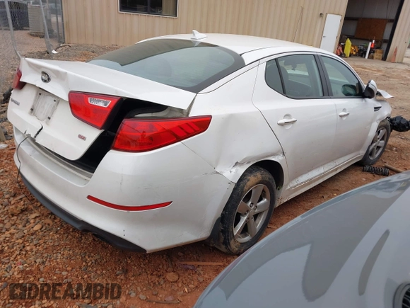 2015 Kia Optima LX with VIN KNAGM4A73F5646213, listed as a IAAI auction lot 41290553 with 101,415 mi miles. Bid and sale history available at carsss.com. Image 4.