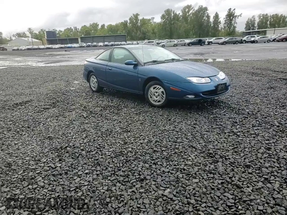 2001 Saturn SC z VIN 1G8ZR12791Z118164, wystawiony jako Copart lot #74393904 z przebiegiem 158 308 mil mil oraz Szkoda całkowita • Salvage title. Historia ofert i sprzedaży dostępna na DreamBid. Obrazek 11.
