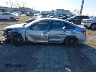 2023 Honda Civic Sport z VIN 2HGFE2F50PH550459, wystawiony jako IAAI lot #41757956 z przebiegiem 48 456 mil mil oraz . Historia ofert i sprzedaży dostępna na DreamBid. Obrazek 14.