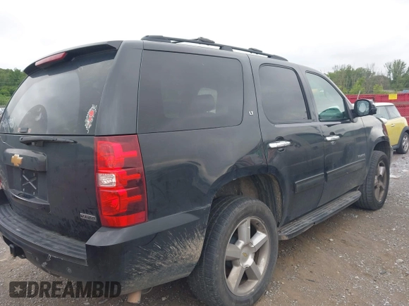 2012 Chevrolet Tahoe LT with VIN 1GNSCBE05CR211898, listed as a IAAI auction lot 42612993 with 233,367 mi miles and . Bid and sale history available at DreamBid. Image 4.