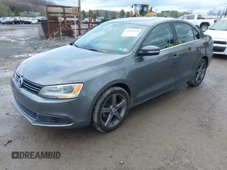 2013 Volkswagen Jetta SE with VIN 3VWBP7AJ2DM395982, listed as a IAAI auction lot 41952654 with 130,906 mi miles and . Bid and sale history available at DreamBid. Image 2.