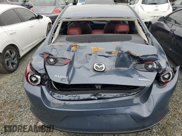 2022 Mazda 3 Carbon Edition with VIN JM1BPACL6N1507664, listed as a Copart auction lot 57847125 with 34,258 mi miles and Salvage title. Bid and sale history available at DreamBid. Image 6.