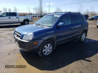 2005 Hyundai Tucson GL with VIN KM8JM72D55U167063, listed as a Copart auction lot 52002865 with 157,945 mi miles and Salvage Title. Bid and sale history available at carsss.com. Image 1.
