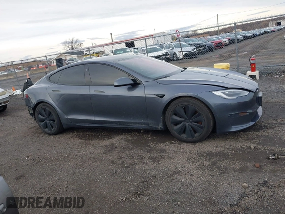 2021 Tesla Model S Long Range with VIN 5YJSA1E51MF440929, listed as a IAAI auction lot 41144902 with Not provided miles and . Bid and sale history available at DreamBid. Image 13.