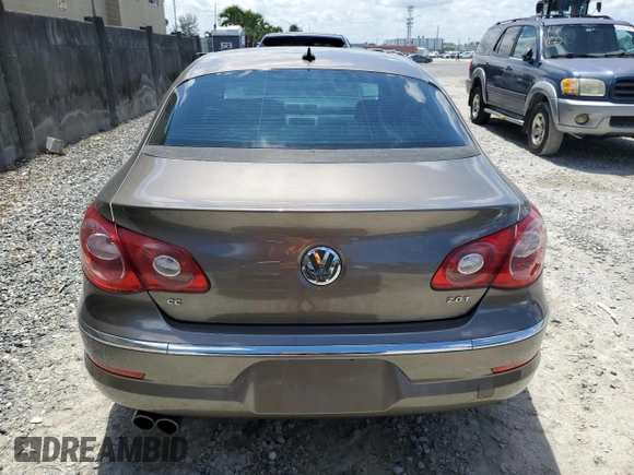 2012 Volkswagen CC Sport PZEV with VIN WVWMP7AN4CE516224, listed as a Copart auction lot 64900354 with 101,533 mi miles and Salvage Title. Bid and sale history available at carsss.com. Image 6.