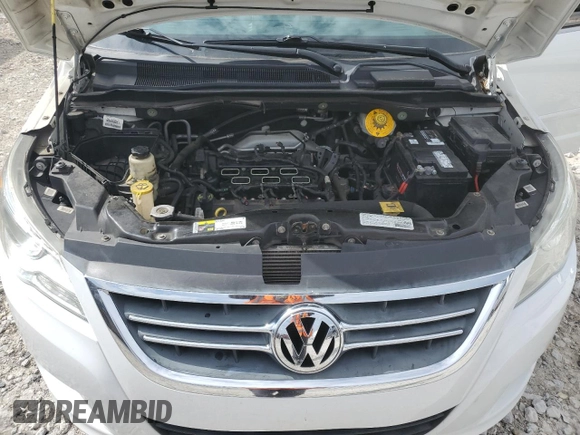 2014 Volkswagen Routan SE z VIN 2C4RVABG0ER134352, wystawiony jako Copart lot #58467235 z przebiegiem 161 822 mil mil oraz Czysty tytuł • Clean title. Historia ofert i sprzedaży dostępna na DreamBid. Obrazek 12.