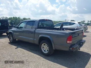 2001 Dodge Dakota with VIN 1B7HL2AX01S338909, listed as a IAAI auction lot 42639655 with 111,858 mi miles and . Bid and sale history available at DreamBid. Image 3.